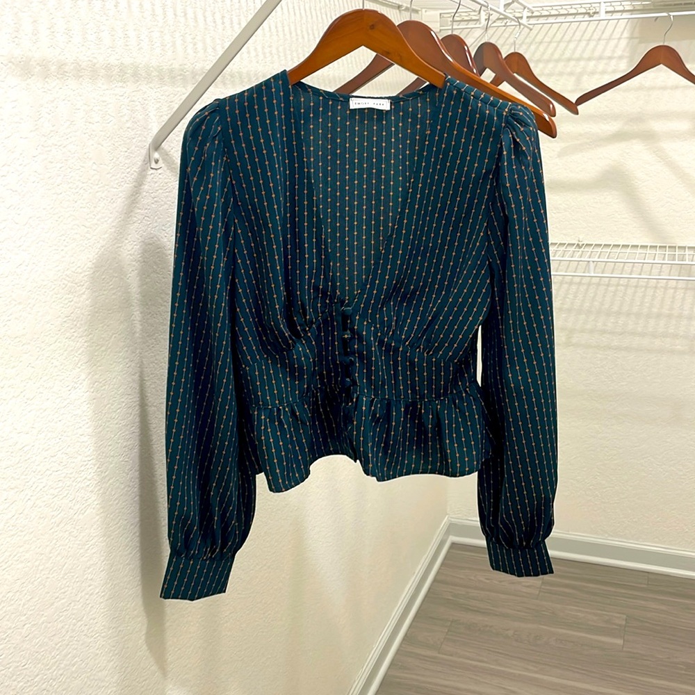 Long sleeve peplum blouse